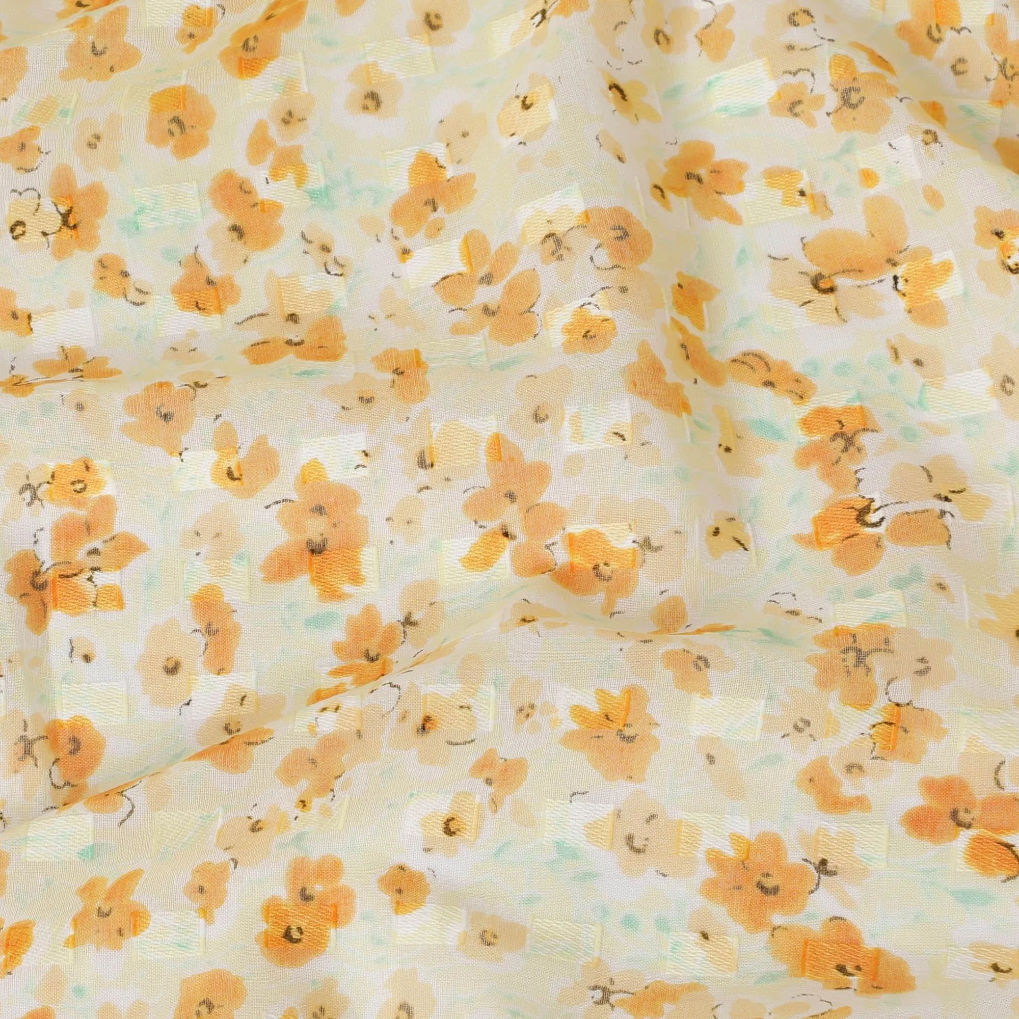 Blonde yellow uragiri cotton voile fabric with same tone jacquard having peach and turquoise green print in clip cord design-D14210