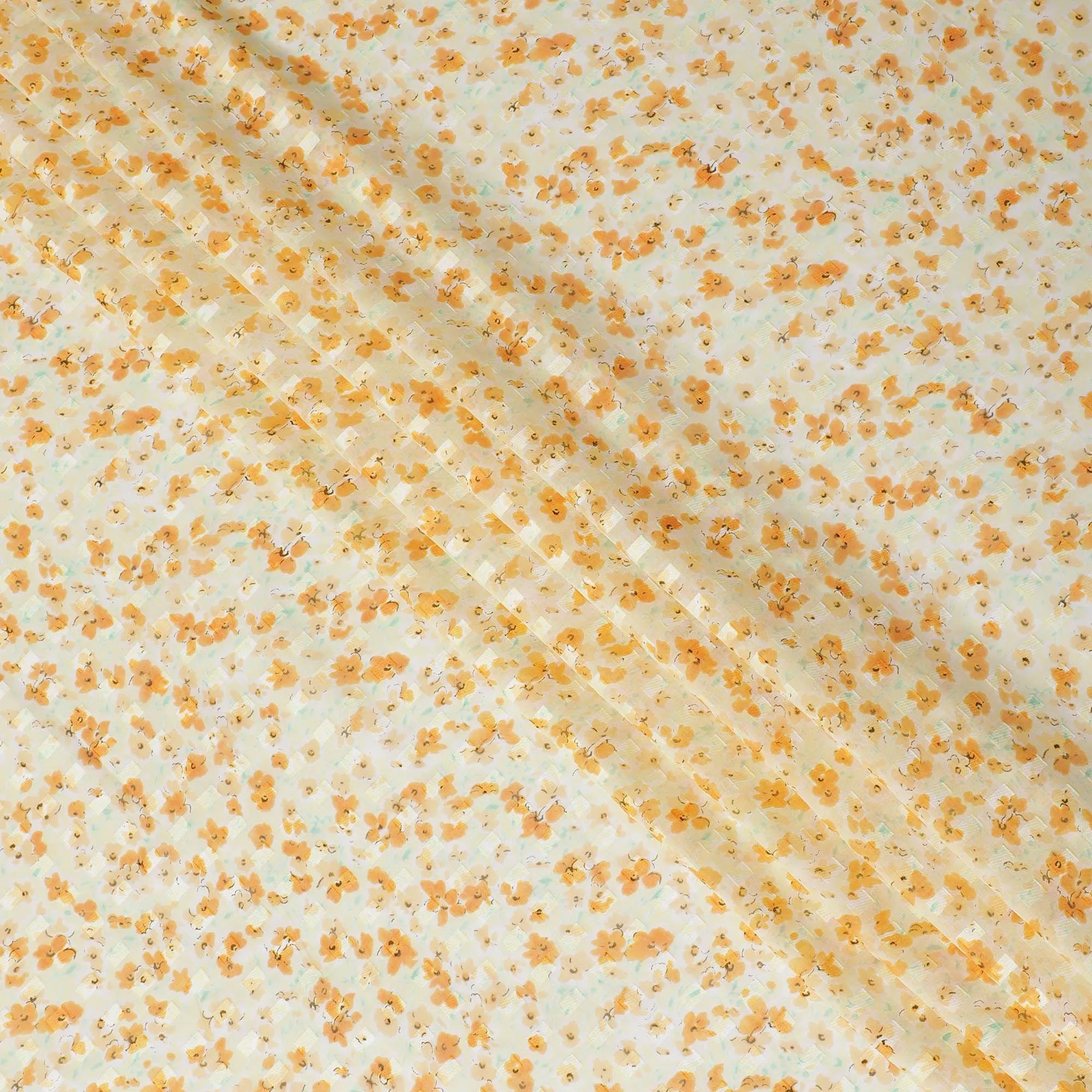 Blonde yellow uragiri cotton voile fabric with same tone jacquard having peach and turquoise green print in clip cord design-D14210