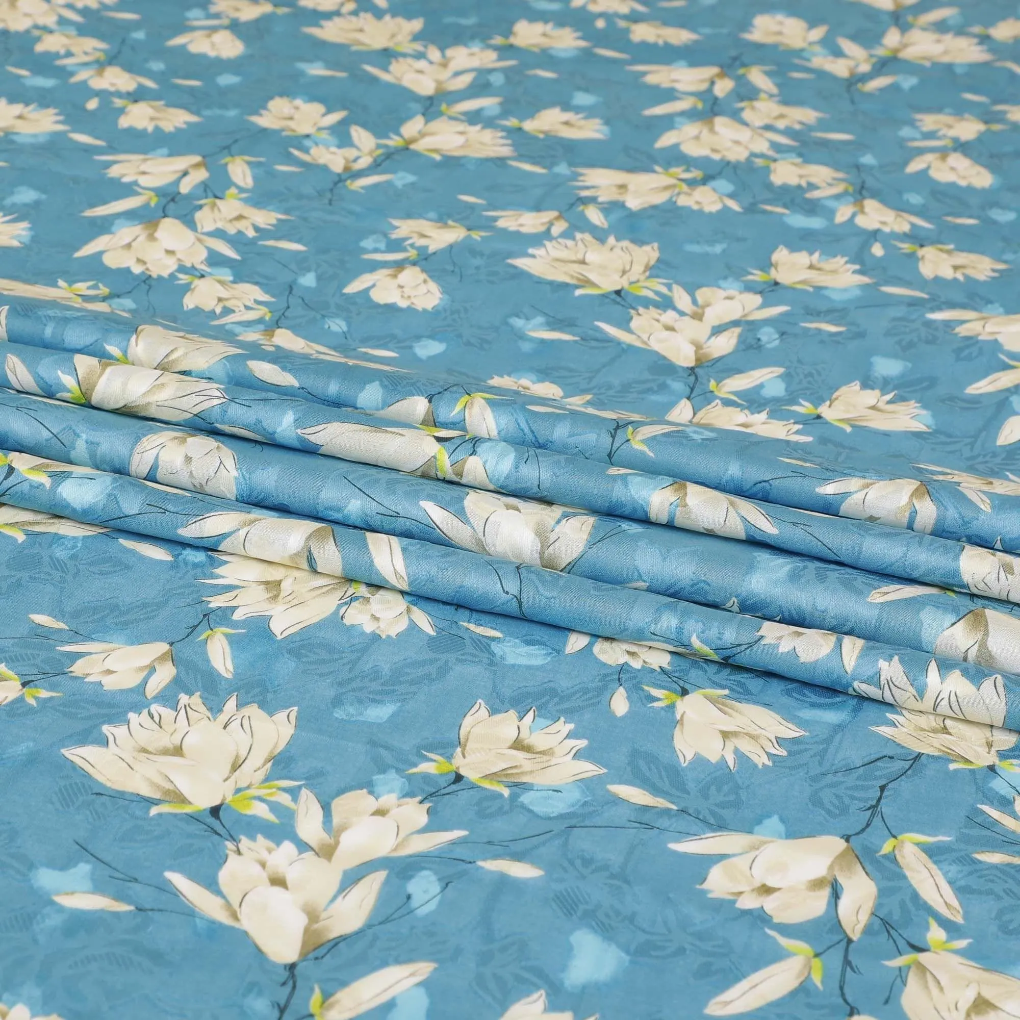 Cerulean blue uragiri cotton voile fabric with same tone jacquard having beige, pearl river grey and petrol blue print in floral design-D7324