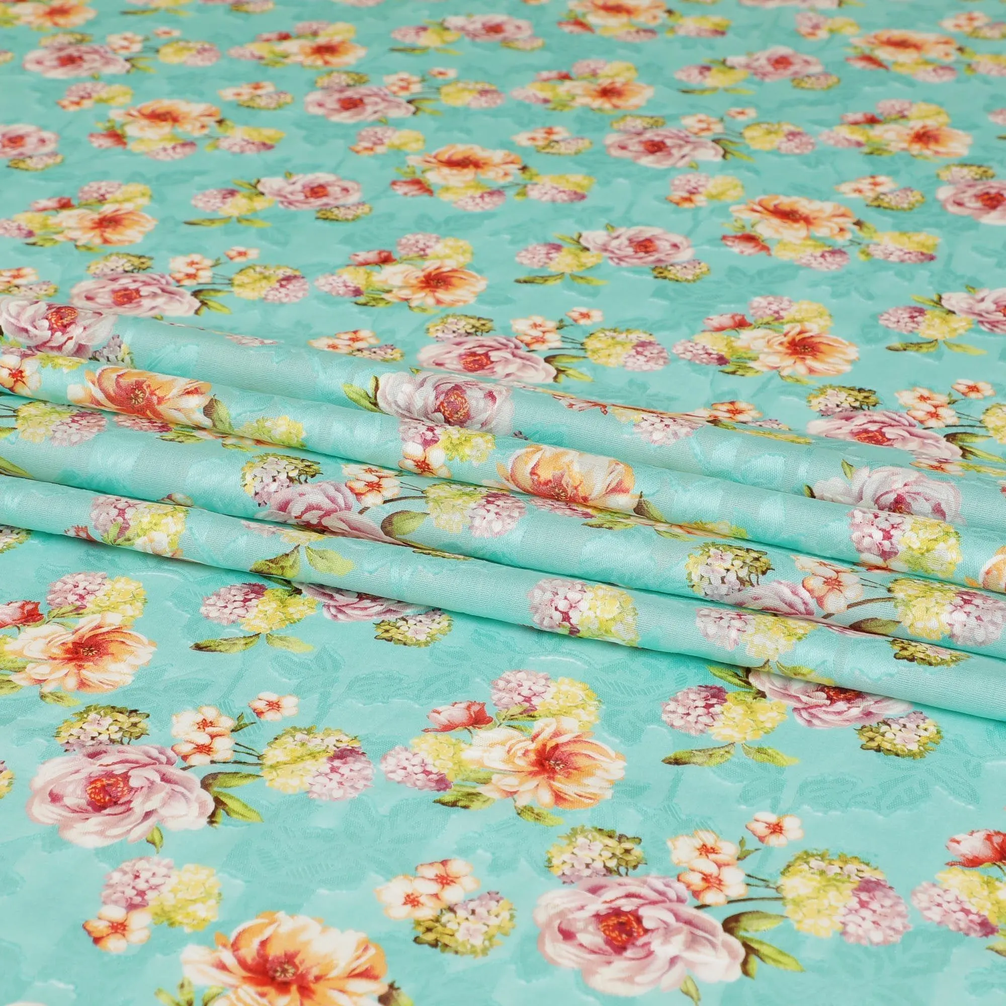 Vista blue uragiri cotton voile fabric with same tone jacquard having olive green, cerise pink, peach and off white print in floral design-D7342