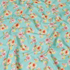 Vista blue uragiri cotton voile fabric with same tone jacquard having olive green, cerise pink, peach and off white print in floral design-D7342